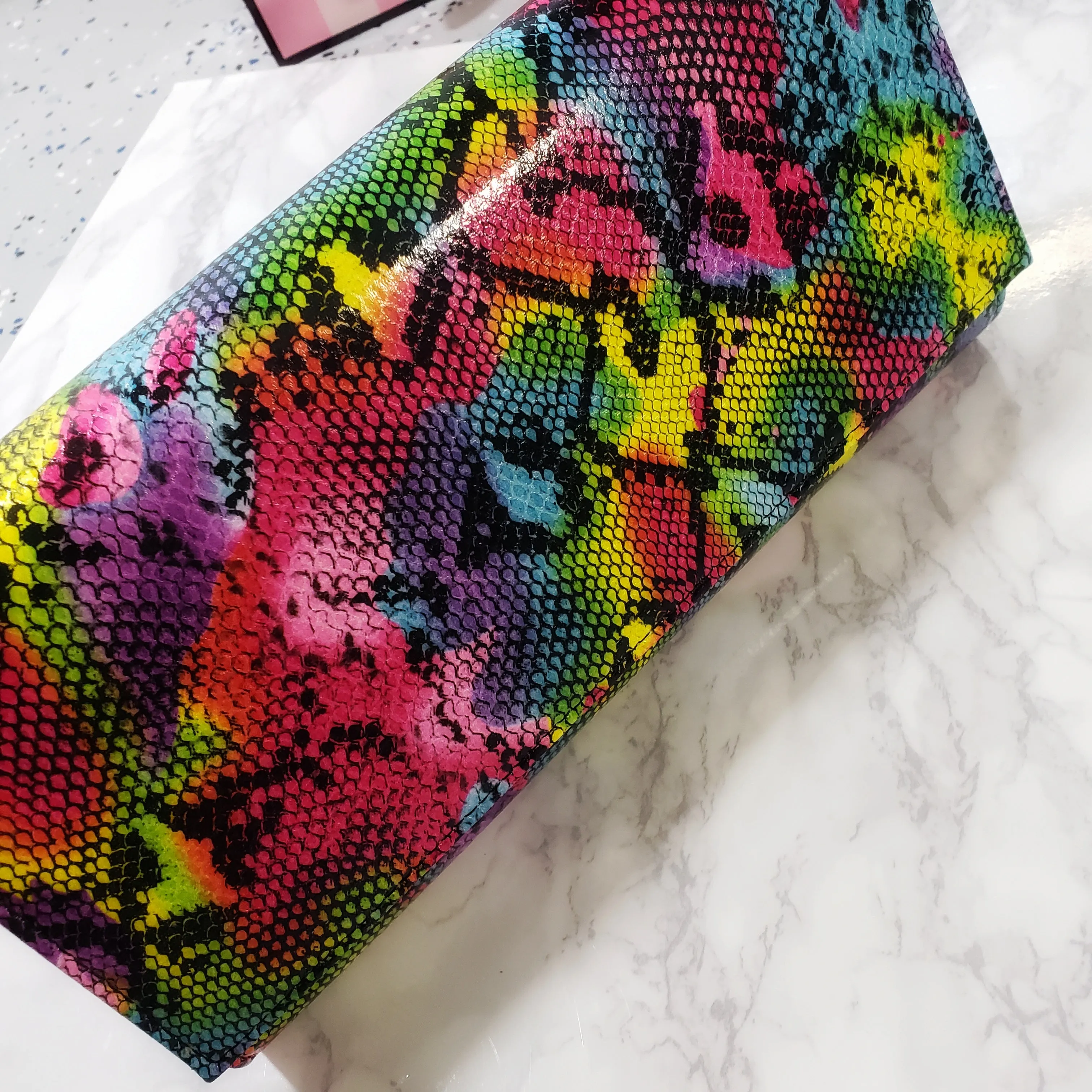 Katie~Multi Snake Clutch