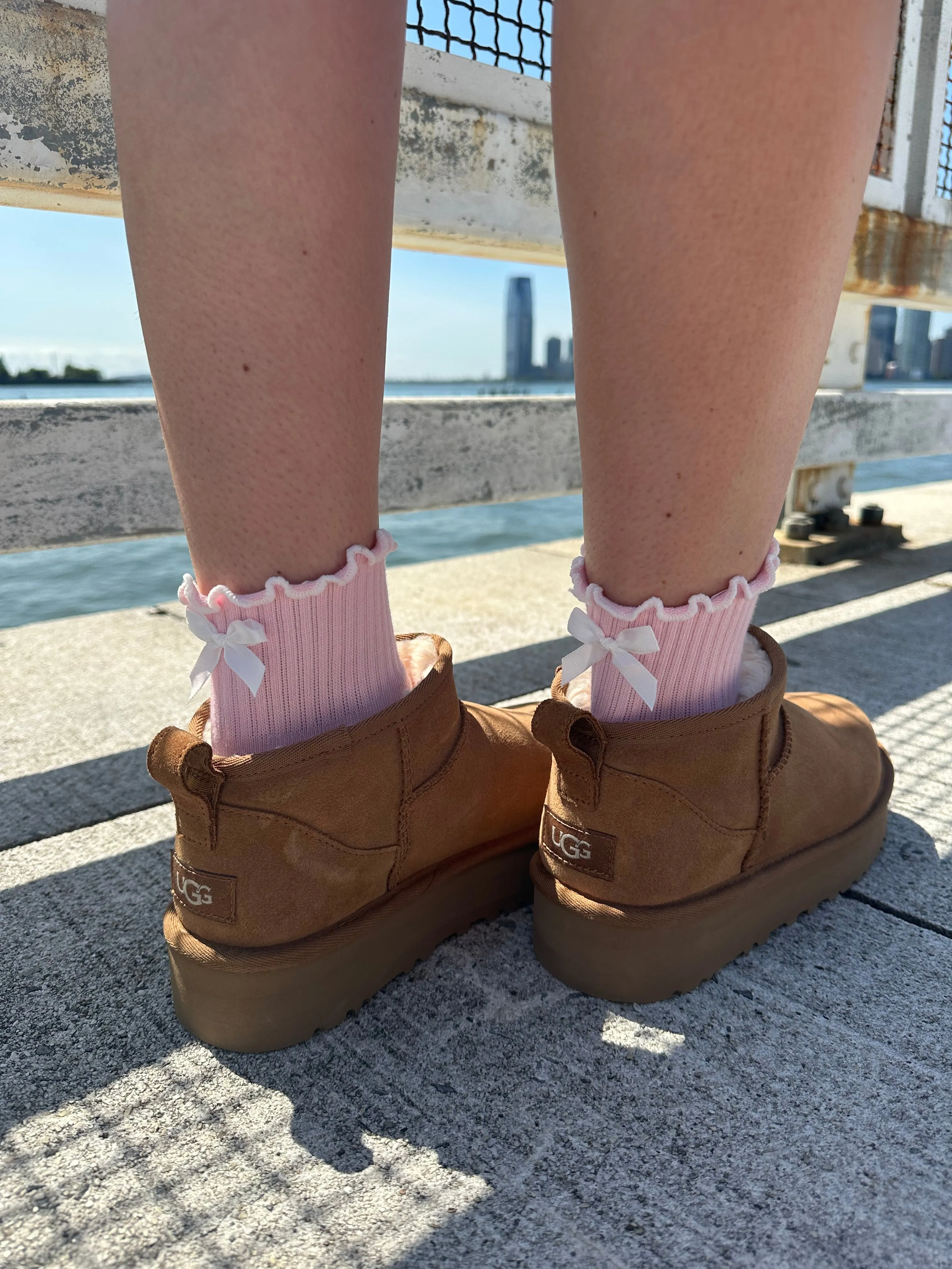 Light Pink ruffle grip sock with white bow